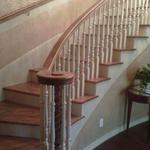 Stained and Varnished Stairway with painted trim,risers, and spindles